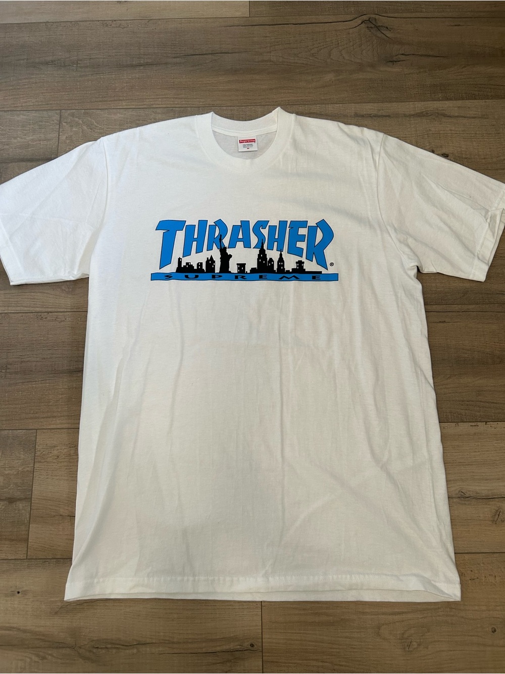 Supreme White Short-Sleeve Tee with Blue Thrasher Graphic
